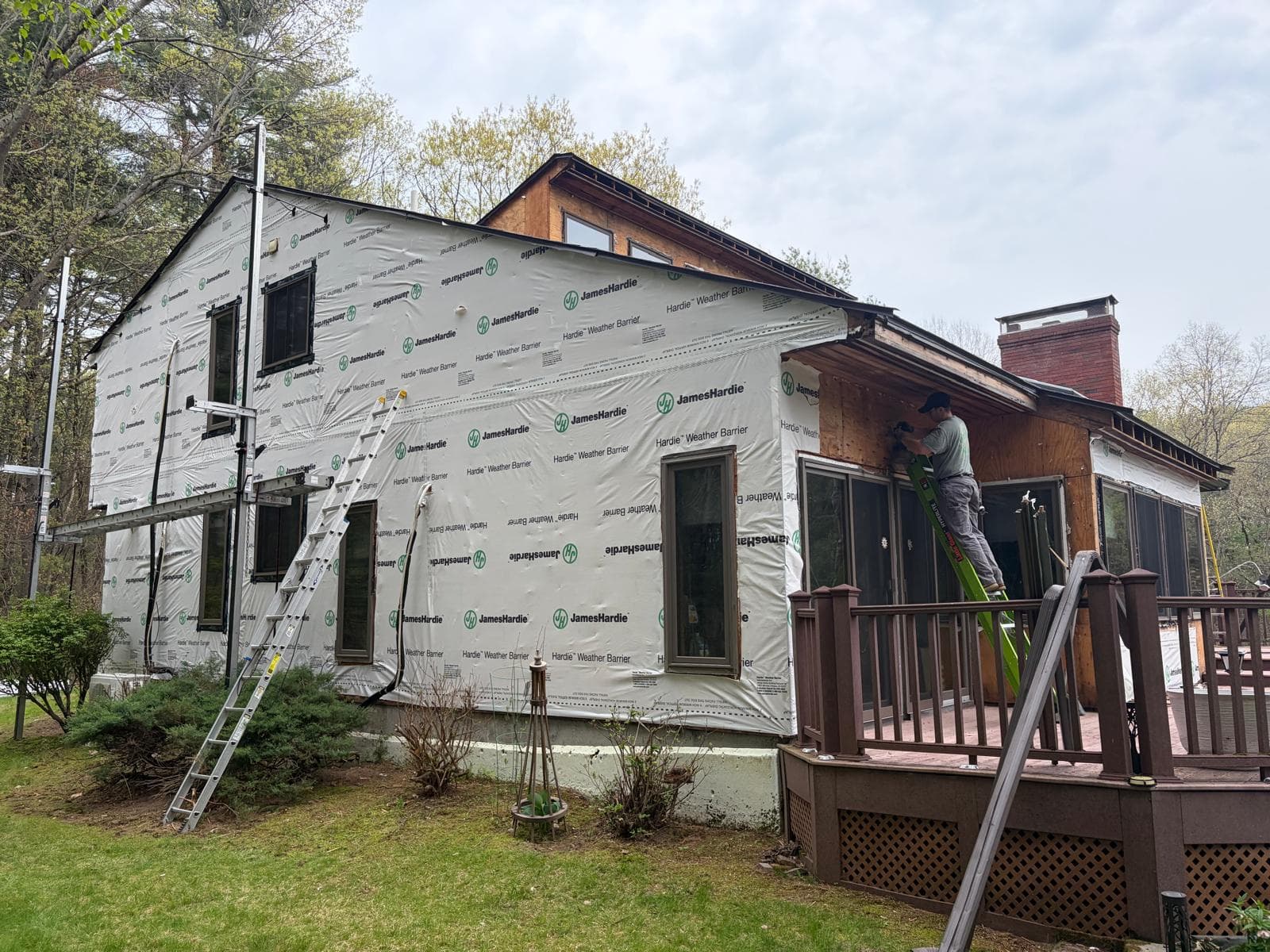 Transition between HardieWrap and existing siding on Carlisle MA home during whole-home re-side
